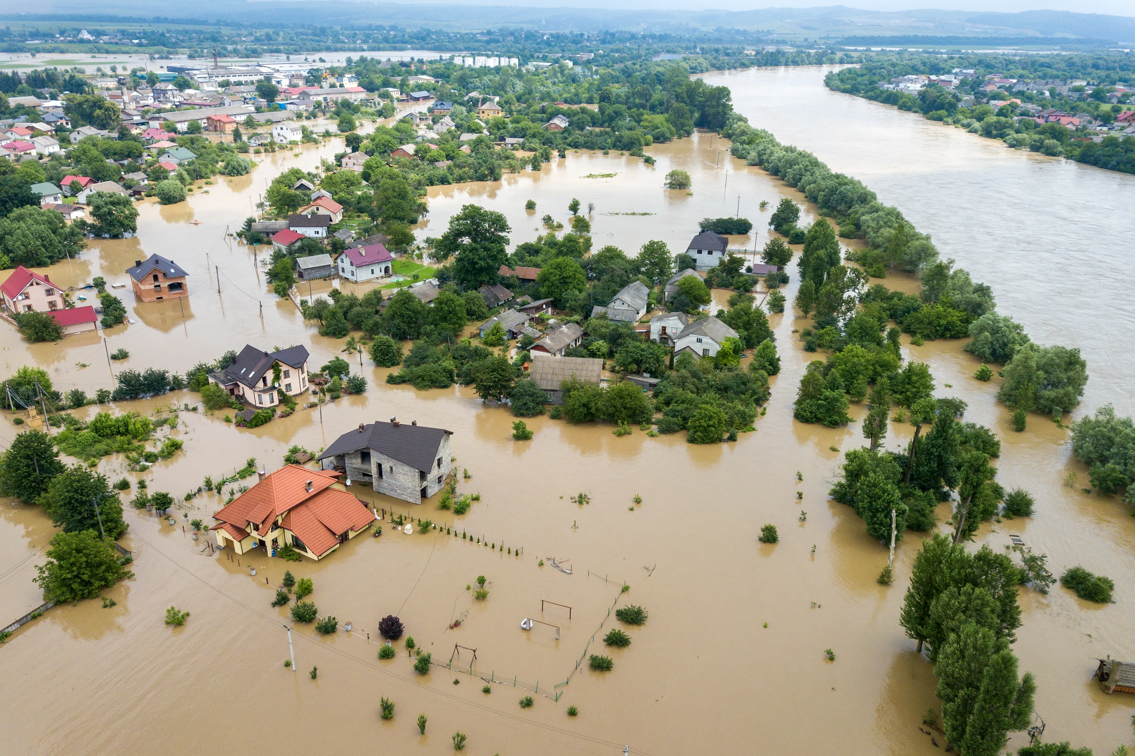 aerial-view-flooded-houses-with-dirty-water-dnister-river-halych-town-western-ukraine